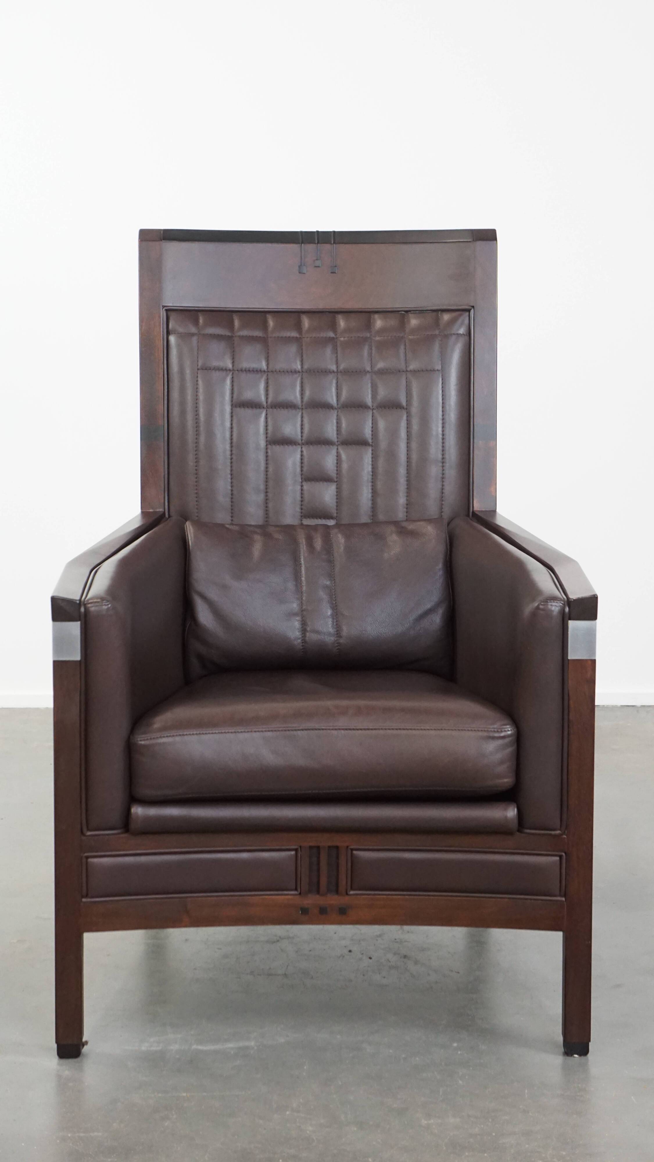Art Deco armchair with dark brown leather