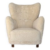 1960s, Danish armchair, genuine sheepskin "Canberra", reupholstered.