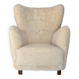 1960s, Danish armchair, genuine sheepskin "Canberra", reupholstered.