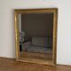 Golden mirror from the late 19th century with decoration. 100x80.