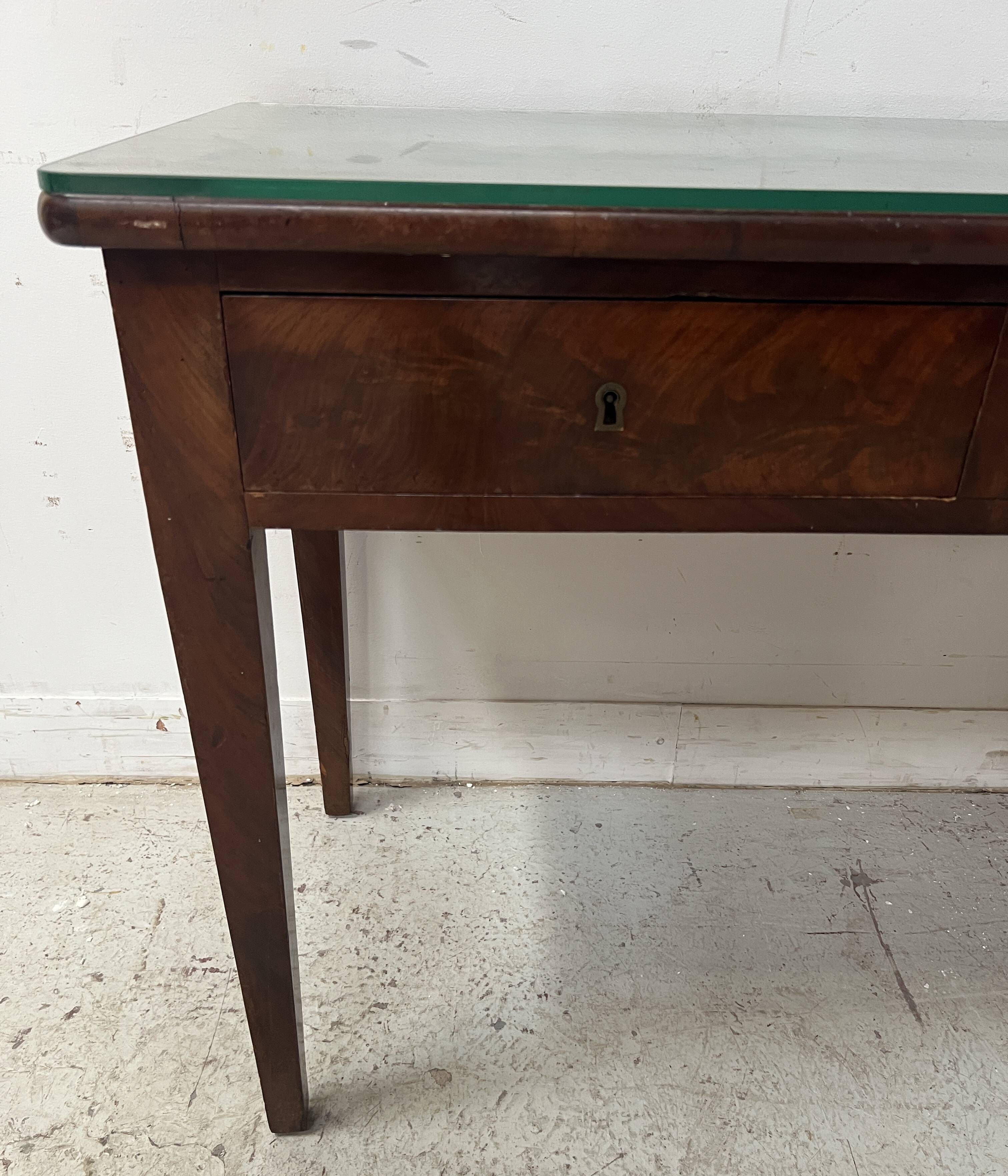 Louis XVI style desk in mahogany and veneer, 19th century.