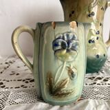 Antique pitcher in thought slip