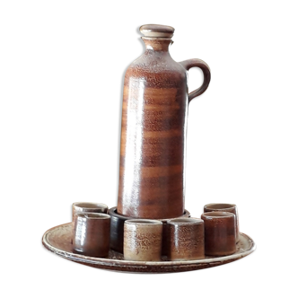 Signed stoneware liqueur service