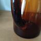 Vintage pitcher in amber glass