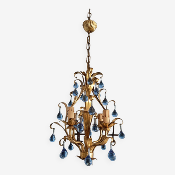 golden chandelier with colored tassels