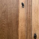 Parisian hotel wardrobe with bevelled mirror, solid raw oak, 1920.