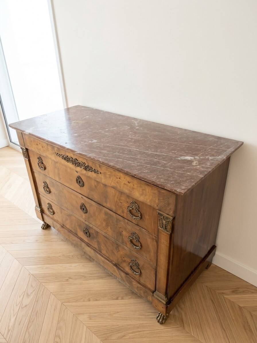 Antique wooden commode with pink marble.