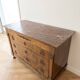 Antique wooden commode with pink marble.