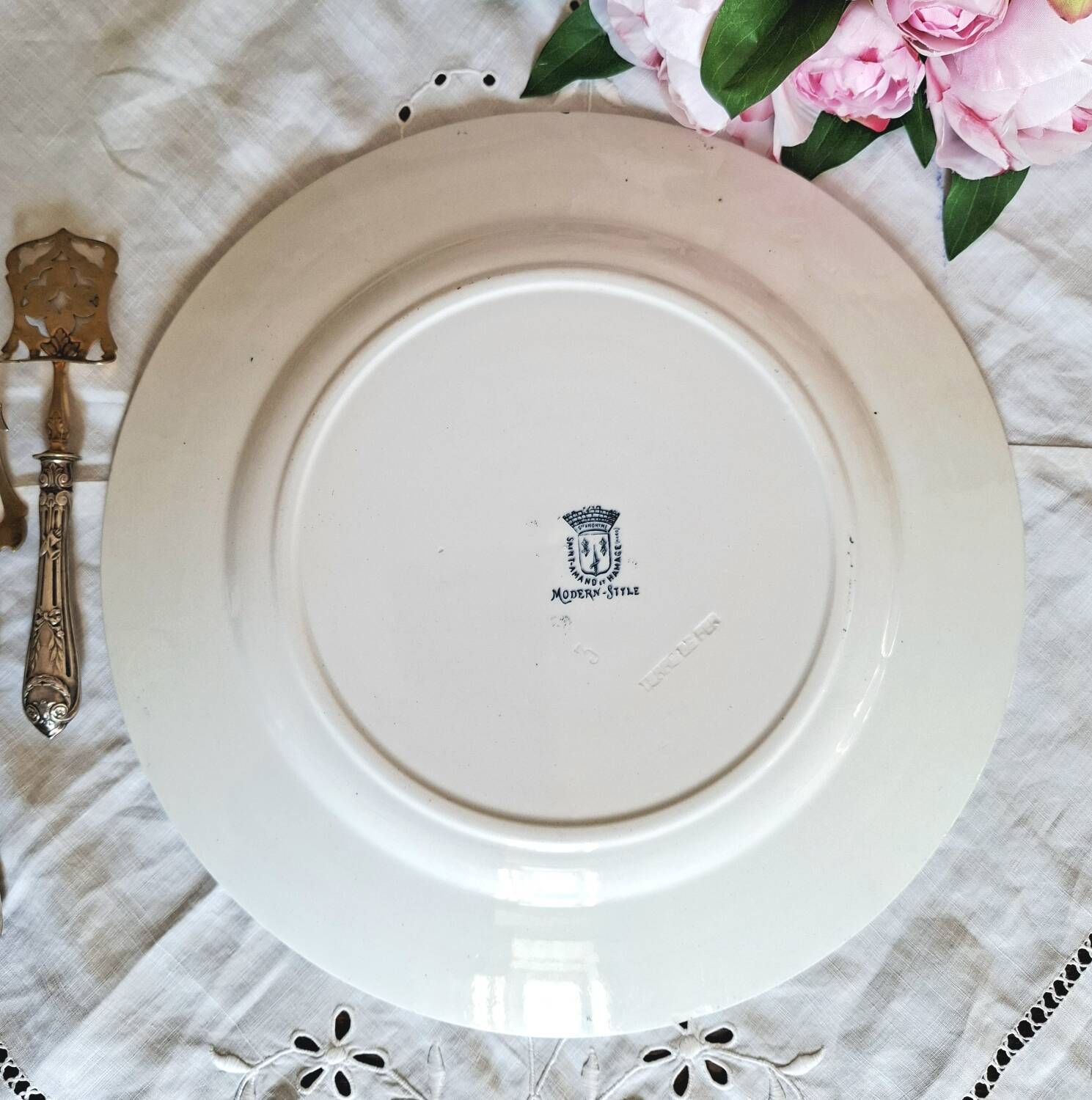 Antique earthenware dessert plates accompanied by a dish
