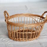 Round openwork wicker storage basket with braided handles