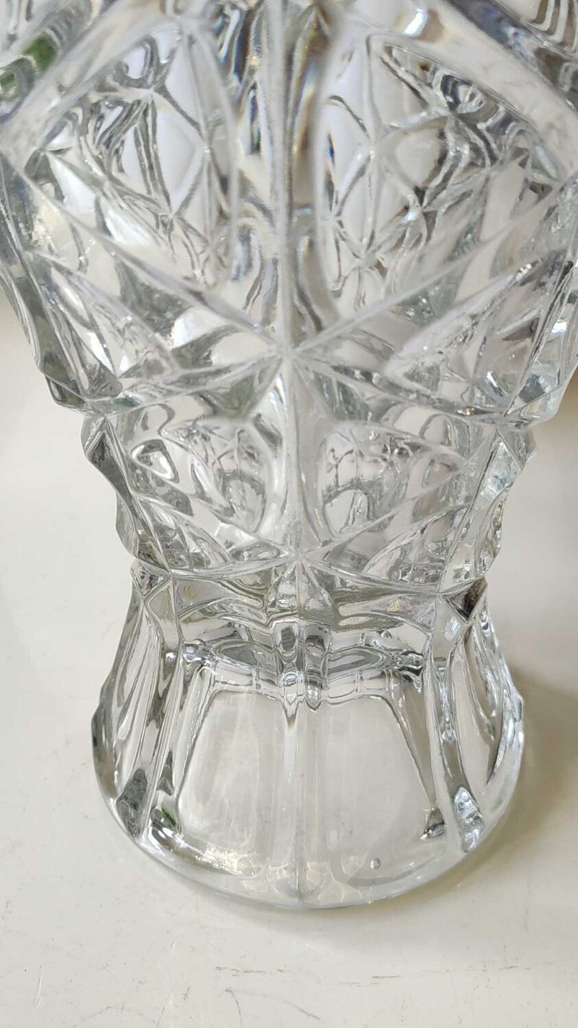 Vintage design vase in crystal. faceted patterns, braces. flared neck