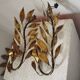 Pair of gold metal floral leaf sconces