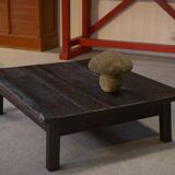Brutalist coffee table in dark spruce with oak base