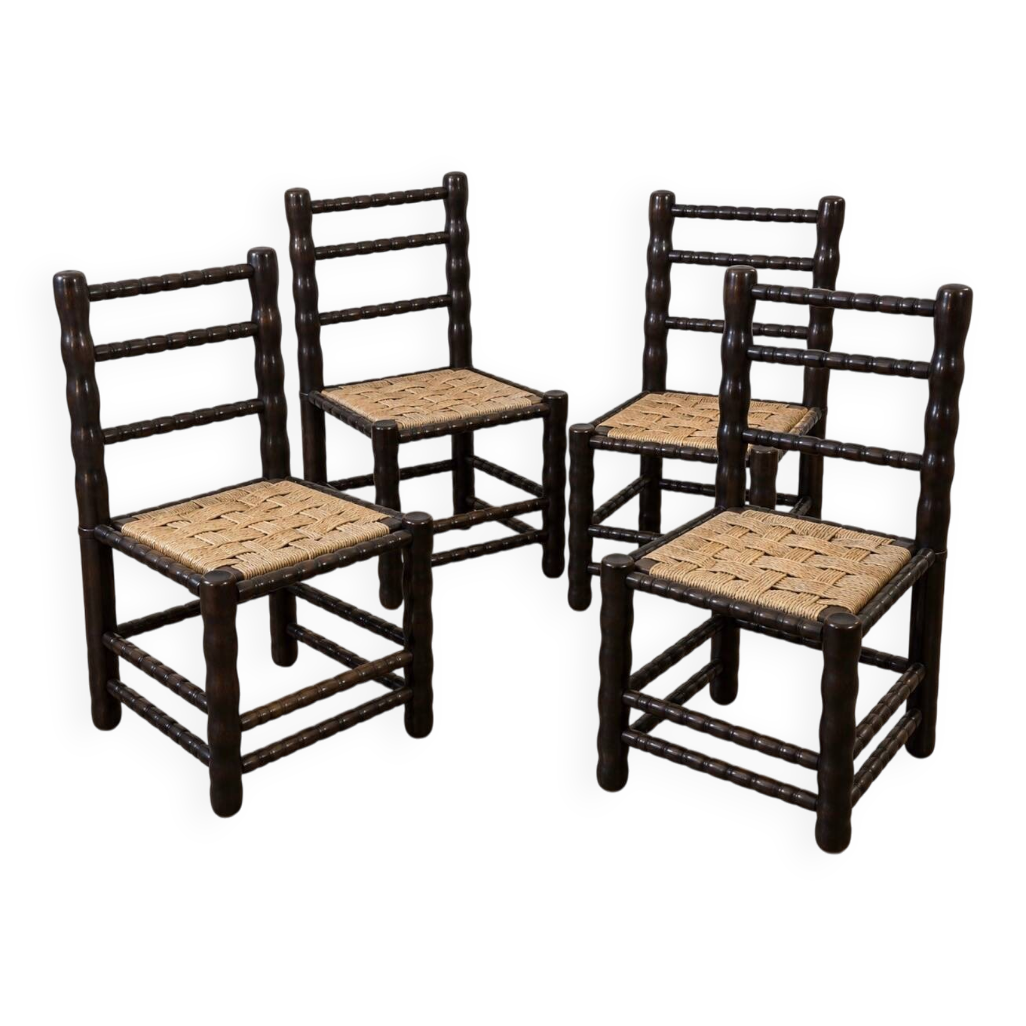 4 blackened wood spindle leg chairs attributed to Charles Dudouyt 1940