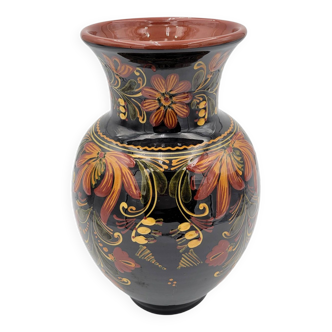 Black vase with floral pattern