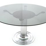 Postmodern chromed metal dining table with a round tempered glass top, italy