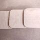 3 travertine trundle tables 1970