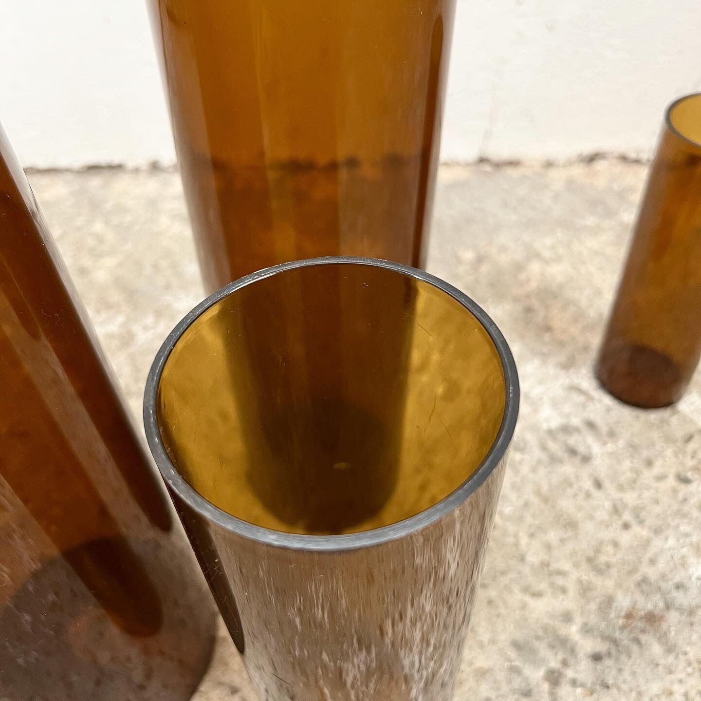 4 Jacques Bédat trundle vases in smoked plexiglass