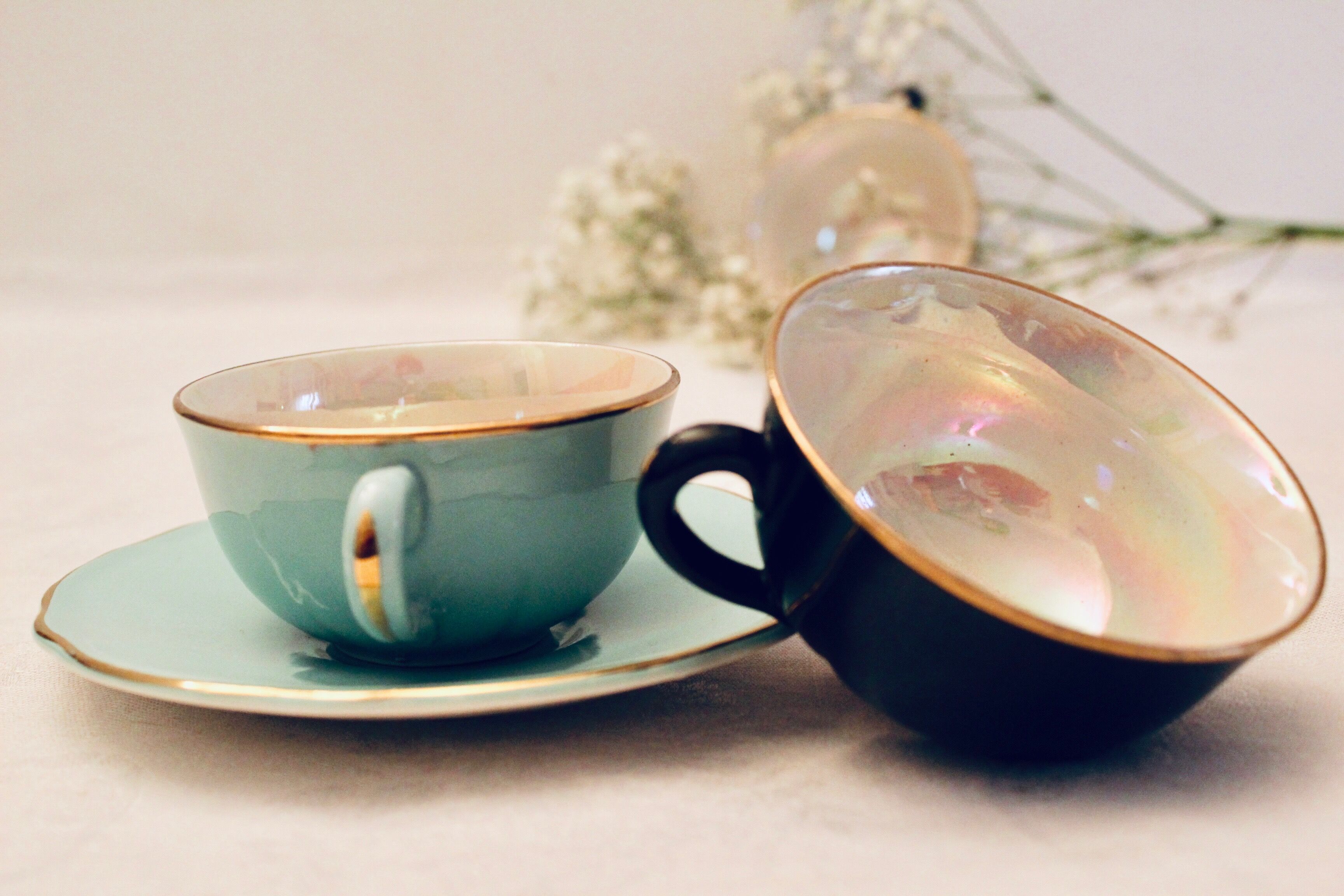 6 multicolored cups and saucers, pearly interior