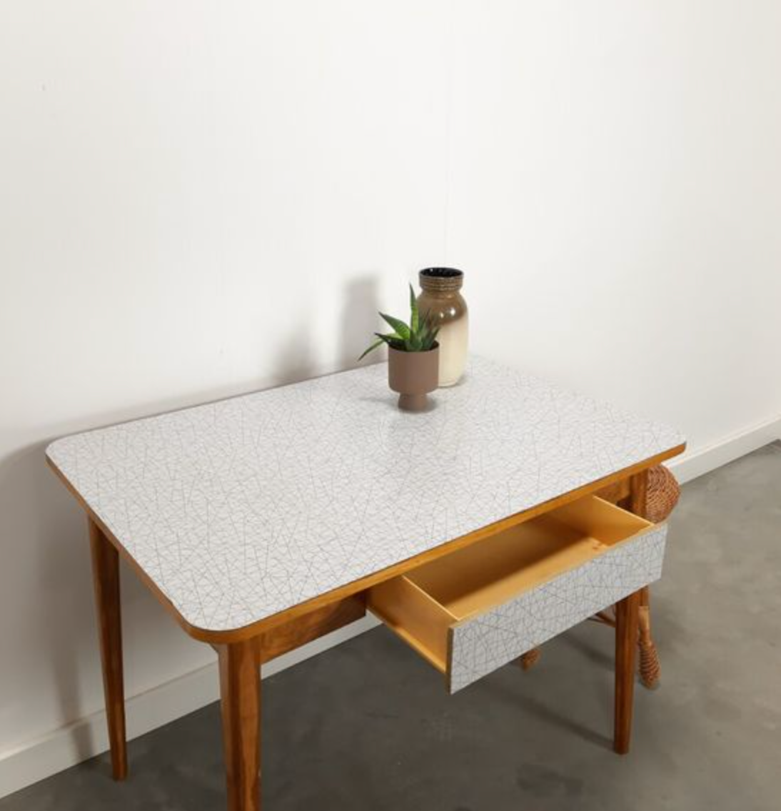Vintage wooden dining table with formica top