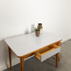 Vintage wooden dining table with formica top
