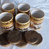 5 ceramic spice jars.