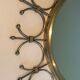Sun mirror in brass and brushed steel