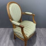 Paire de fauteuils de style Louis XVI en tissu rayé vert, XXème siècle