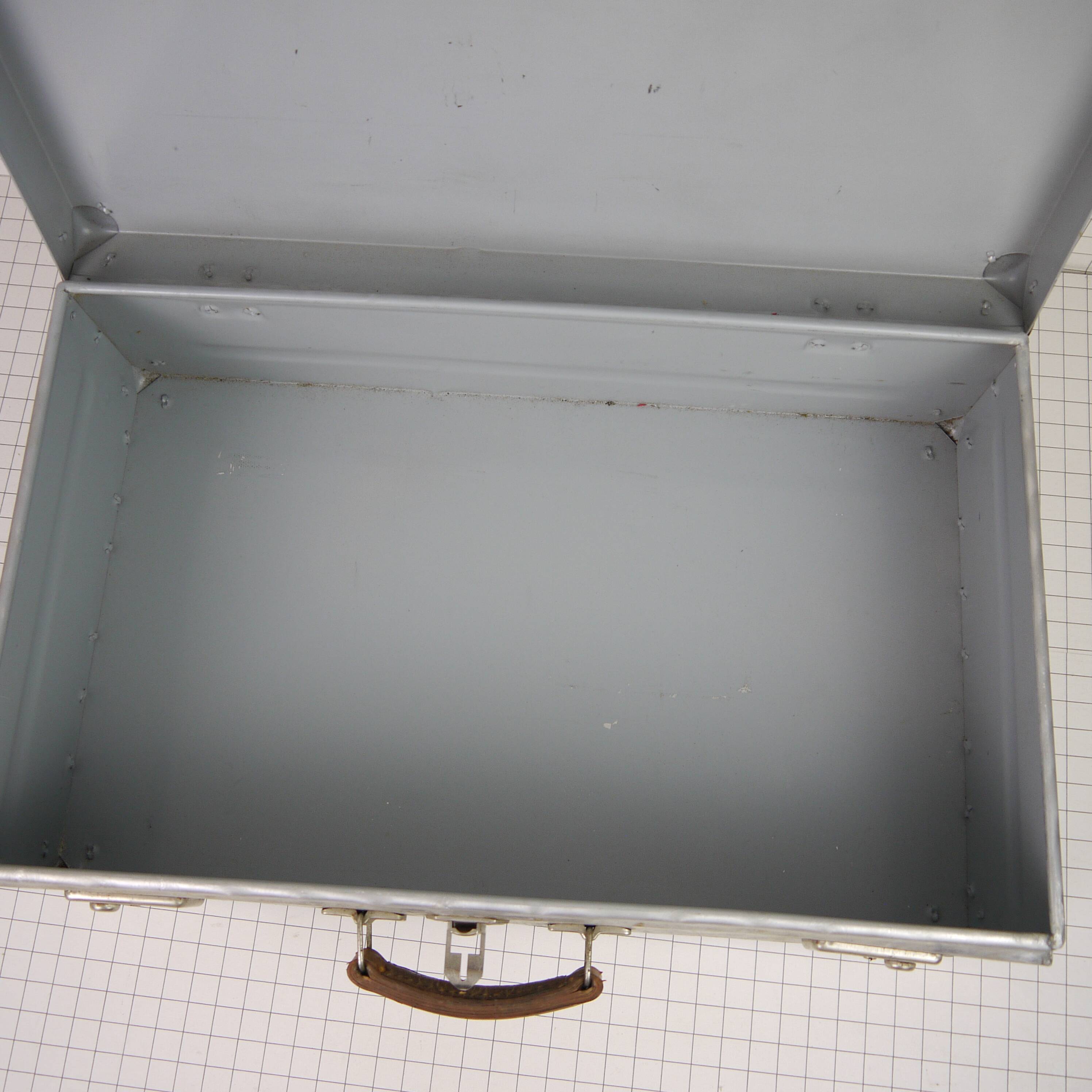 Metal case and leather handle