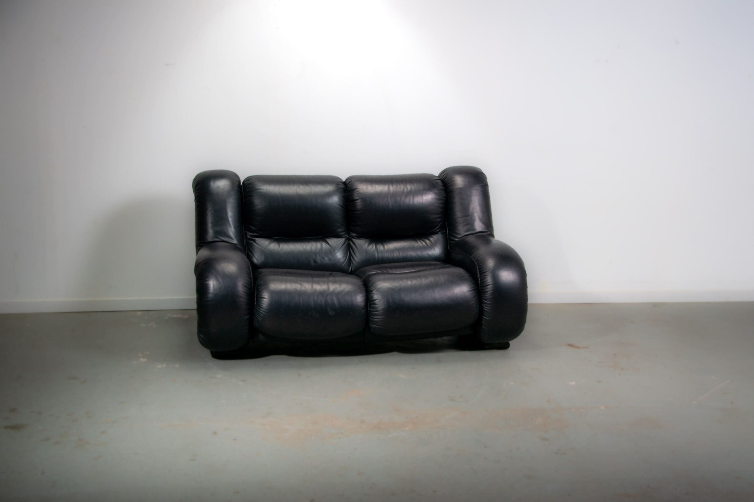 Black leather space age Italian 2 seater sofa