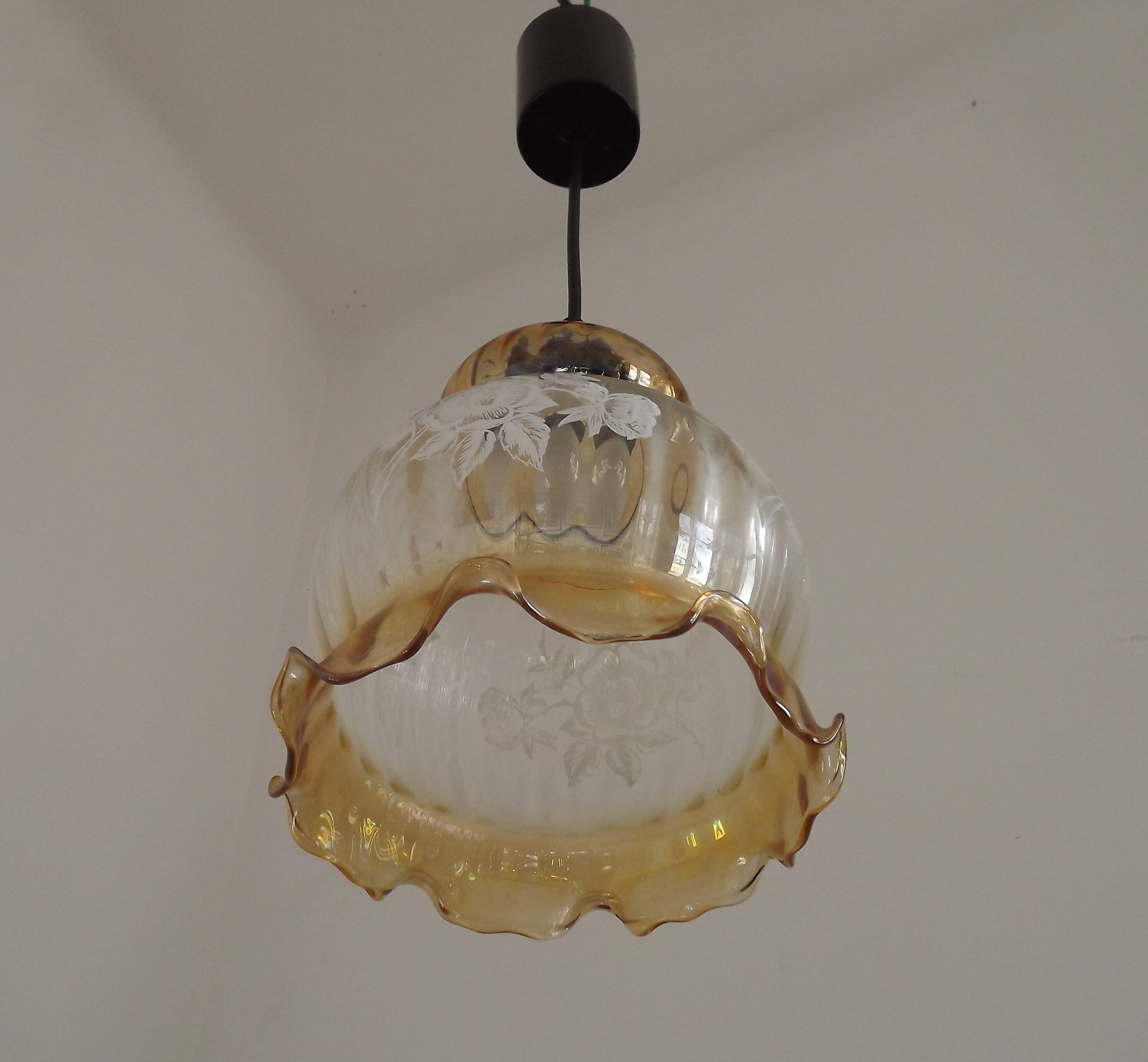 French vintage amber and clear glass ceiling light with white floral decoration.