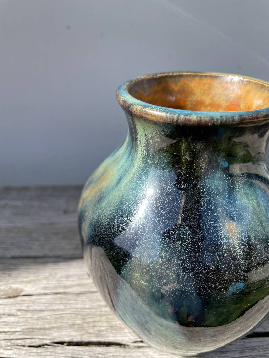 Signed ceramic flamed vase