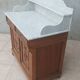 Antique walnut and white marble bathroom cabinet