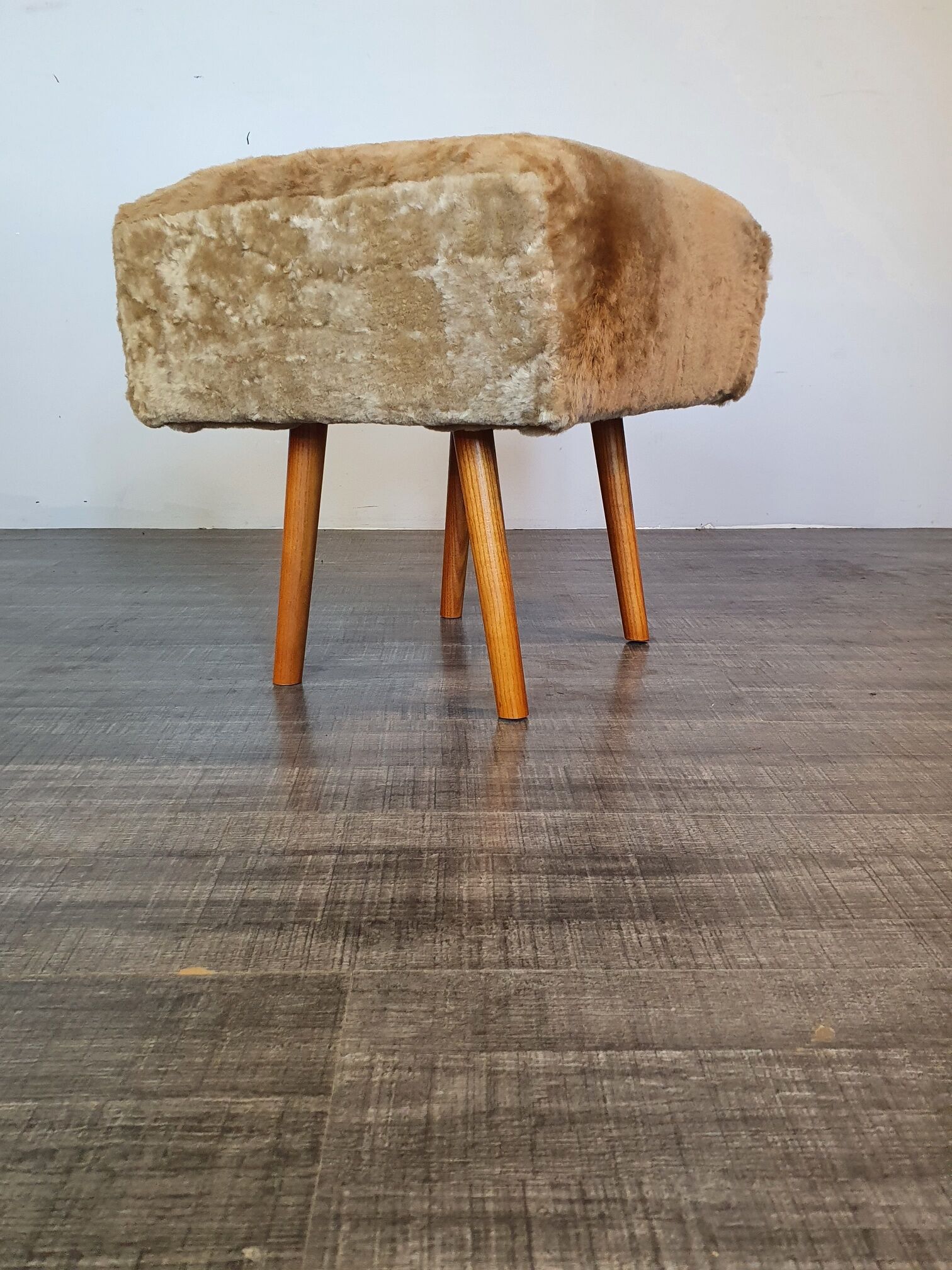 Norwegian sheepskin wing armchair with ottoman 1950