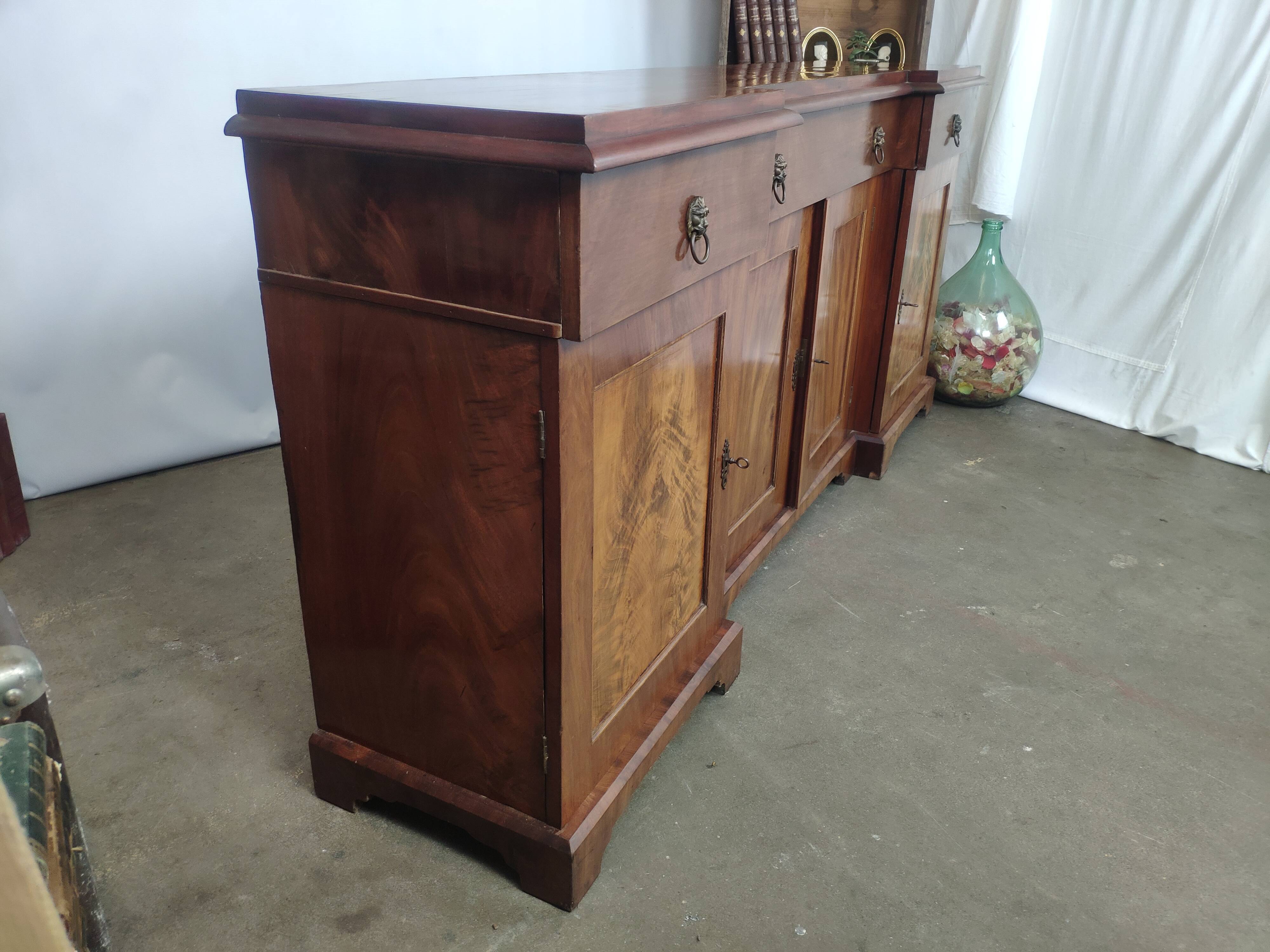 Walnut 4-door lion head sideboard