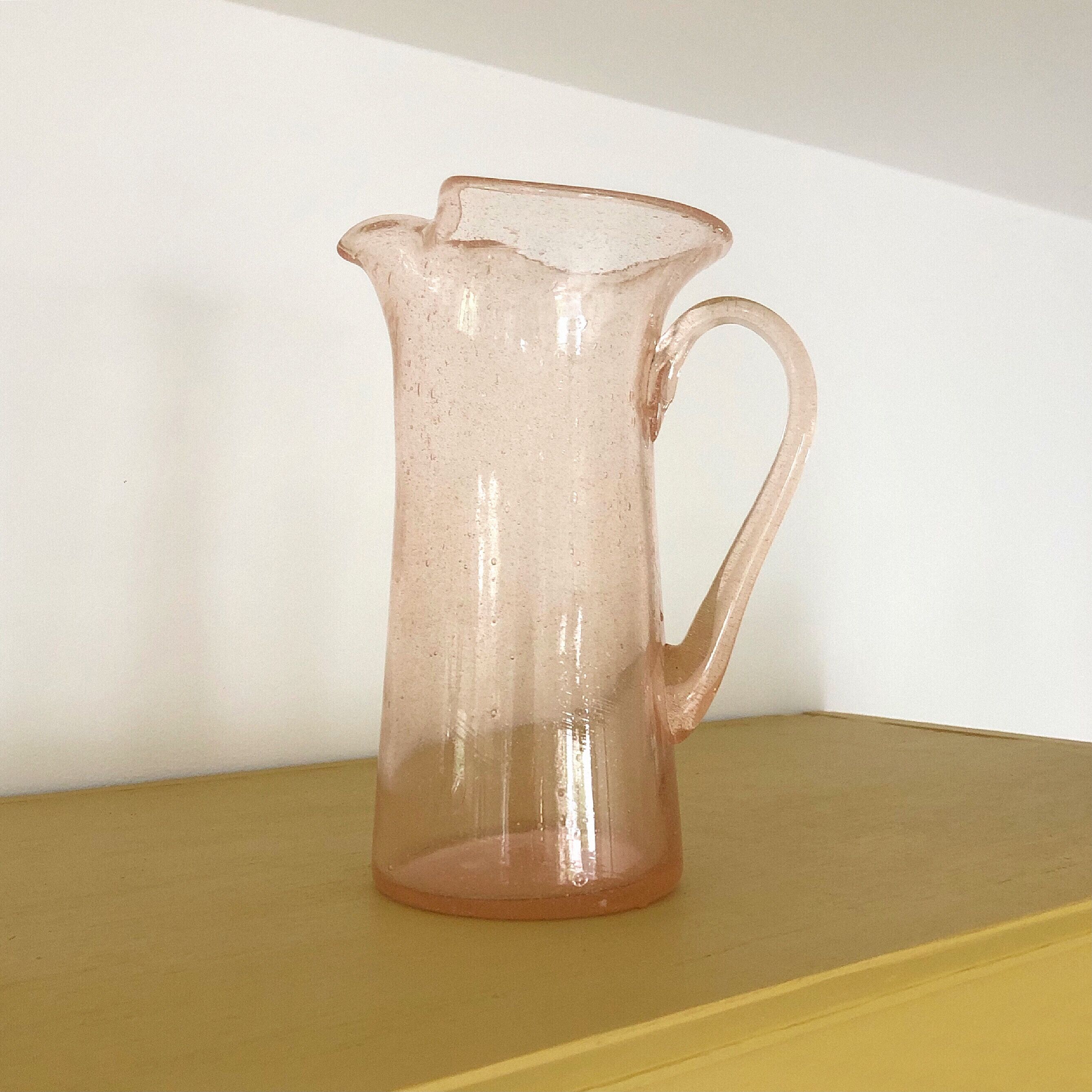 Artisanal pitcher in bulled glass