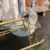 Tinted glass and brass magazine rack