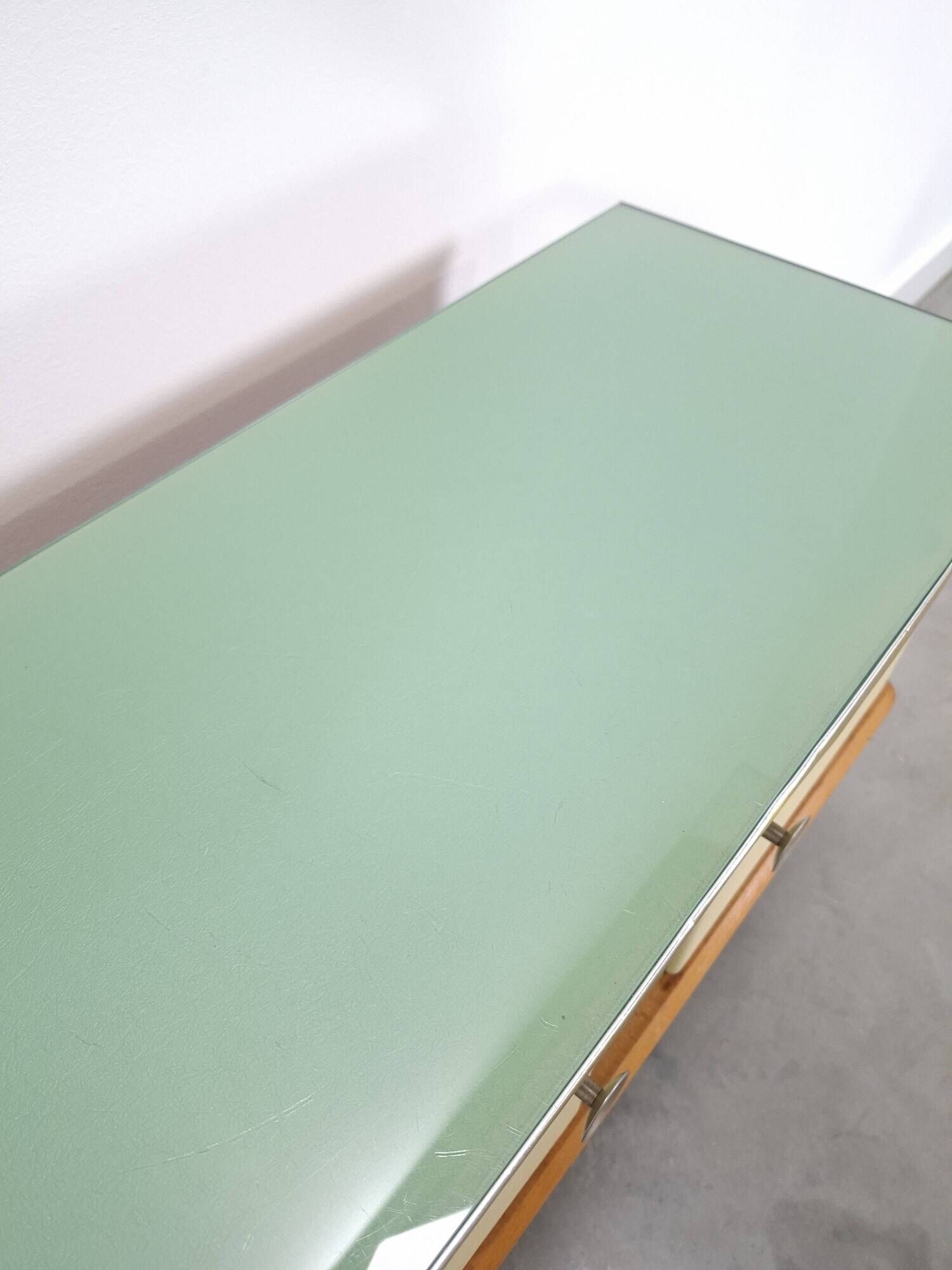 Vintage green DDR cabinet, model Libelle with glass top, slanted legs.