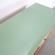Vintage green DDR cabinet, model Libelle with glass top, slanted legs.