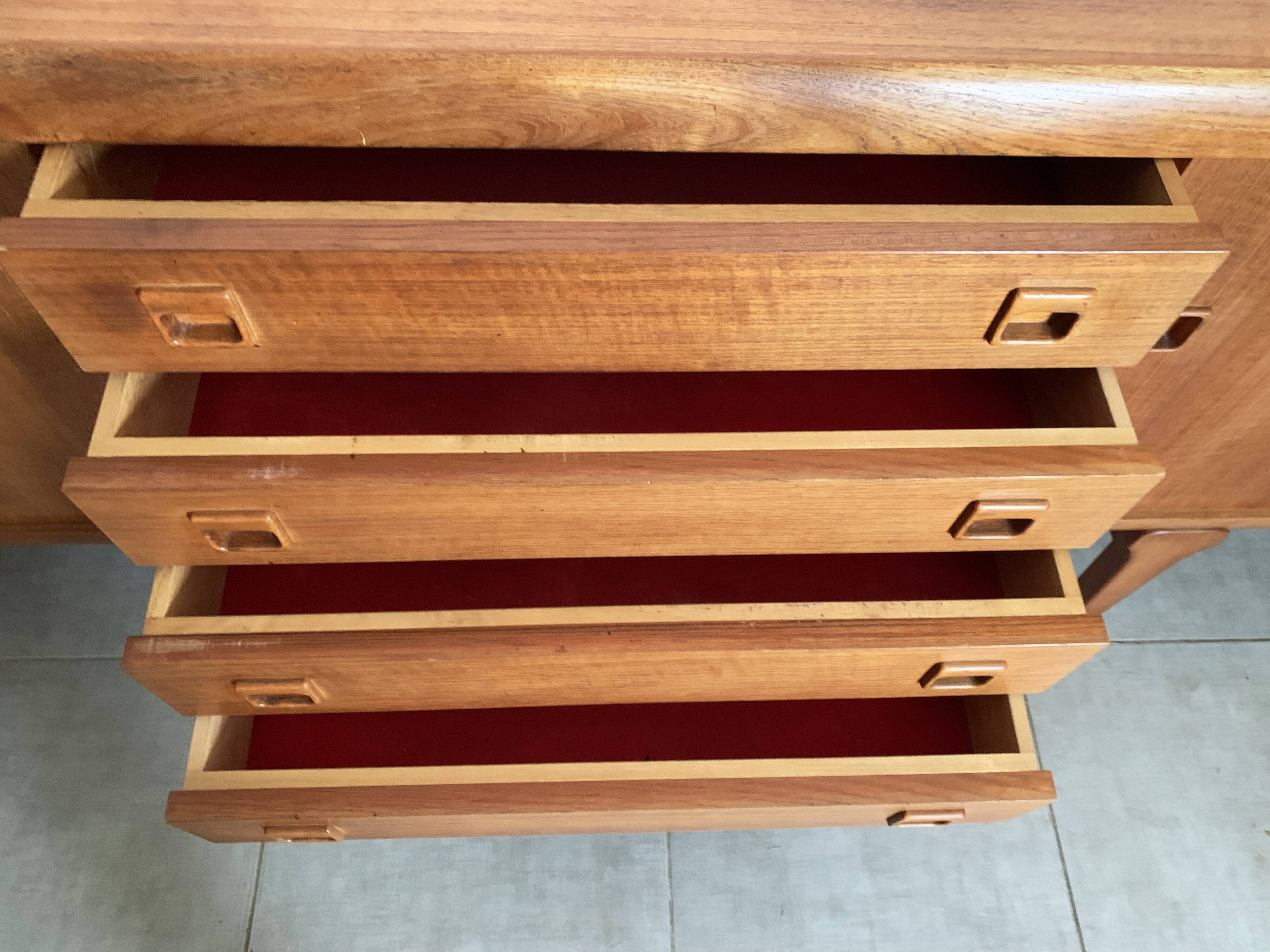 Large Danish vintage row in blond teak from the 60s