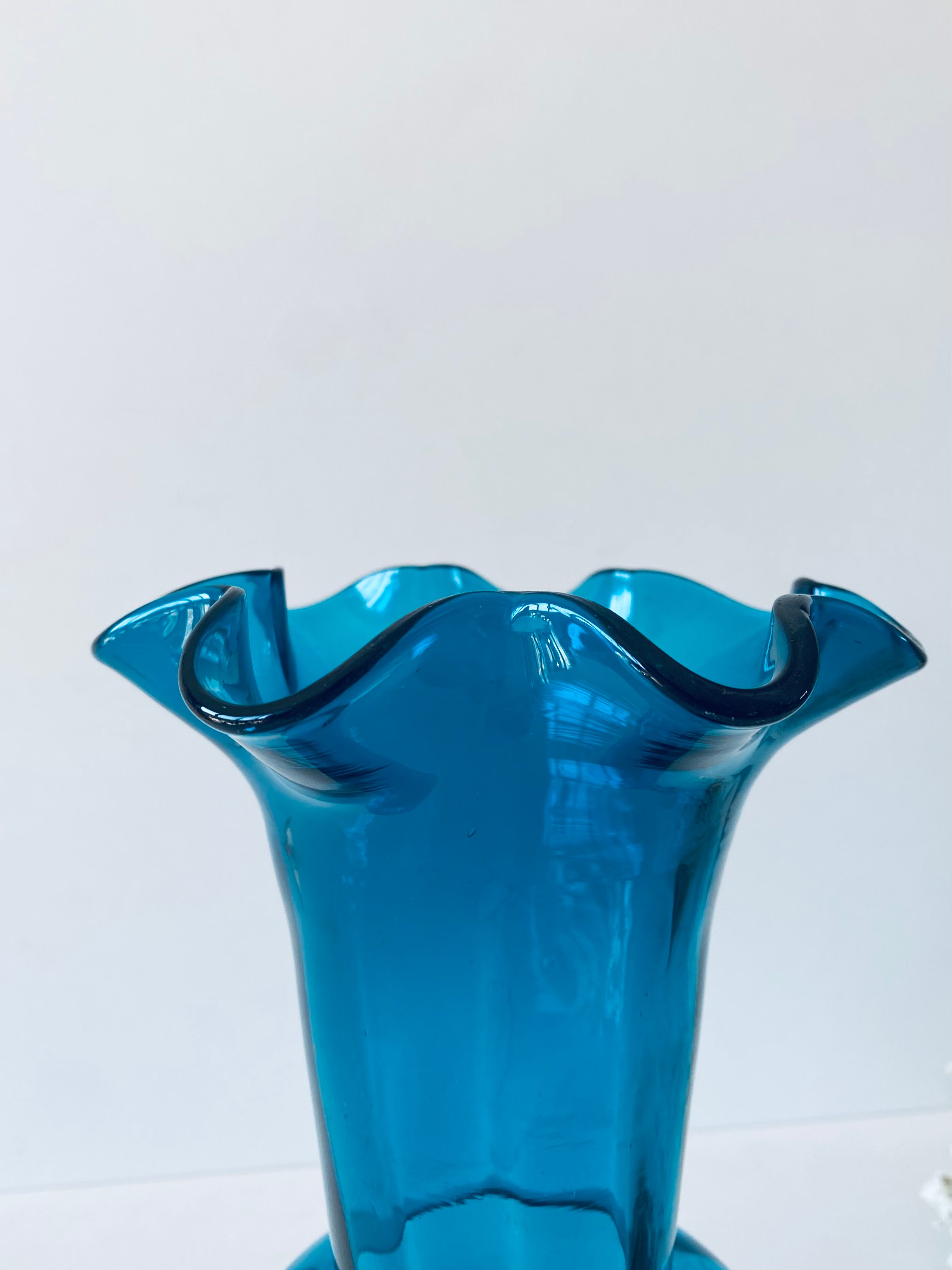 Old blue duck vase with collar