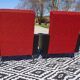 Vintage pair of red and black armchairs