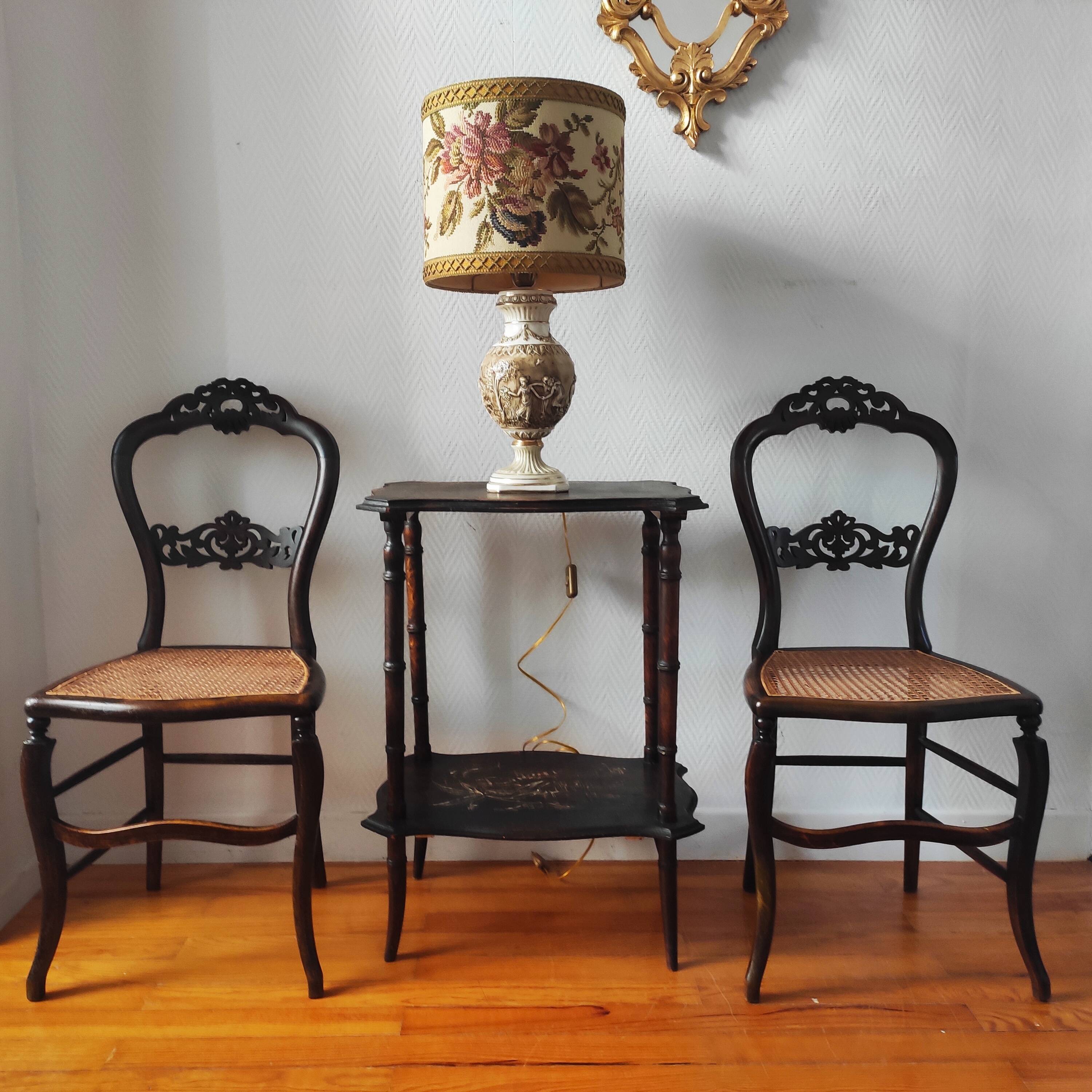 Pair of chairs from the early 20th century, Napoleon III style, with caned seats.