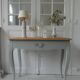 Console, side desk of beautiful craftsmanship re-enchanted in verdigris