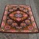 Tapis fleuri vintage