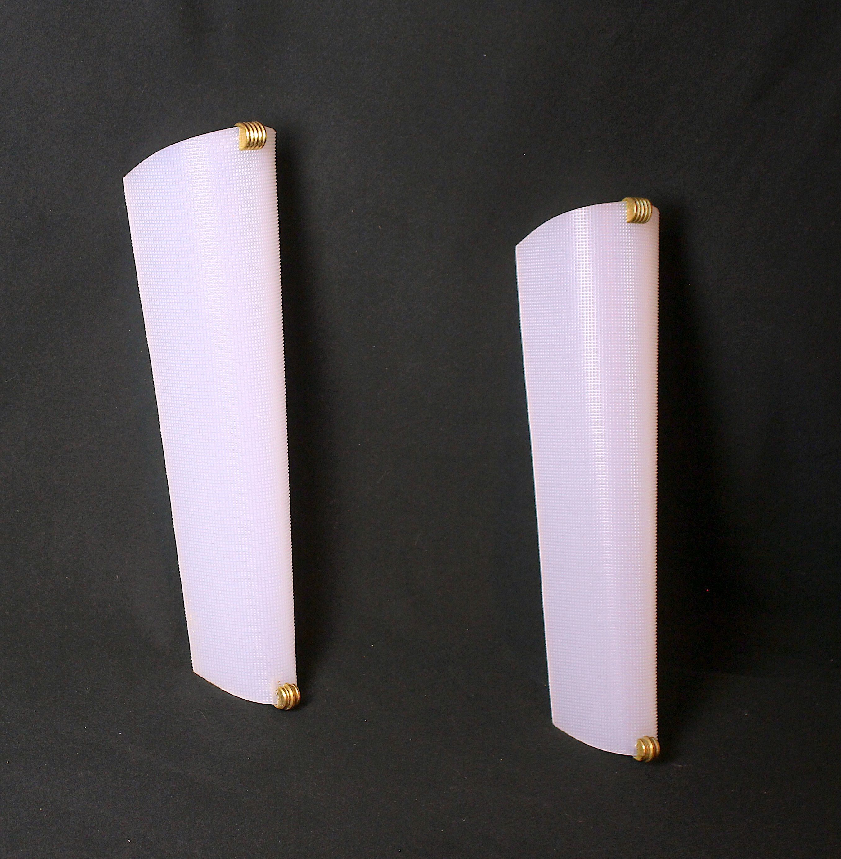 Pair of perspex wall lights with brass detail mid-century France