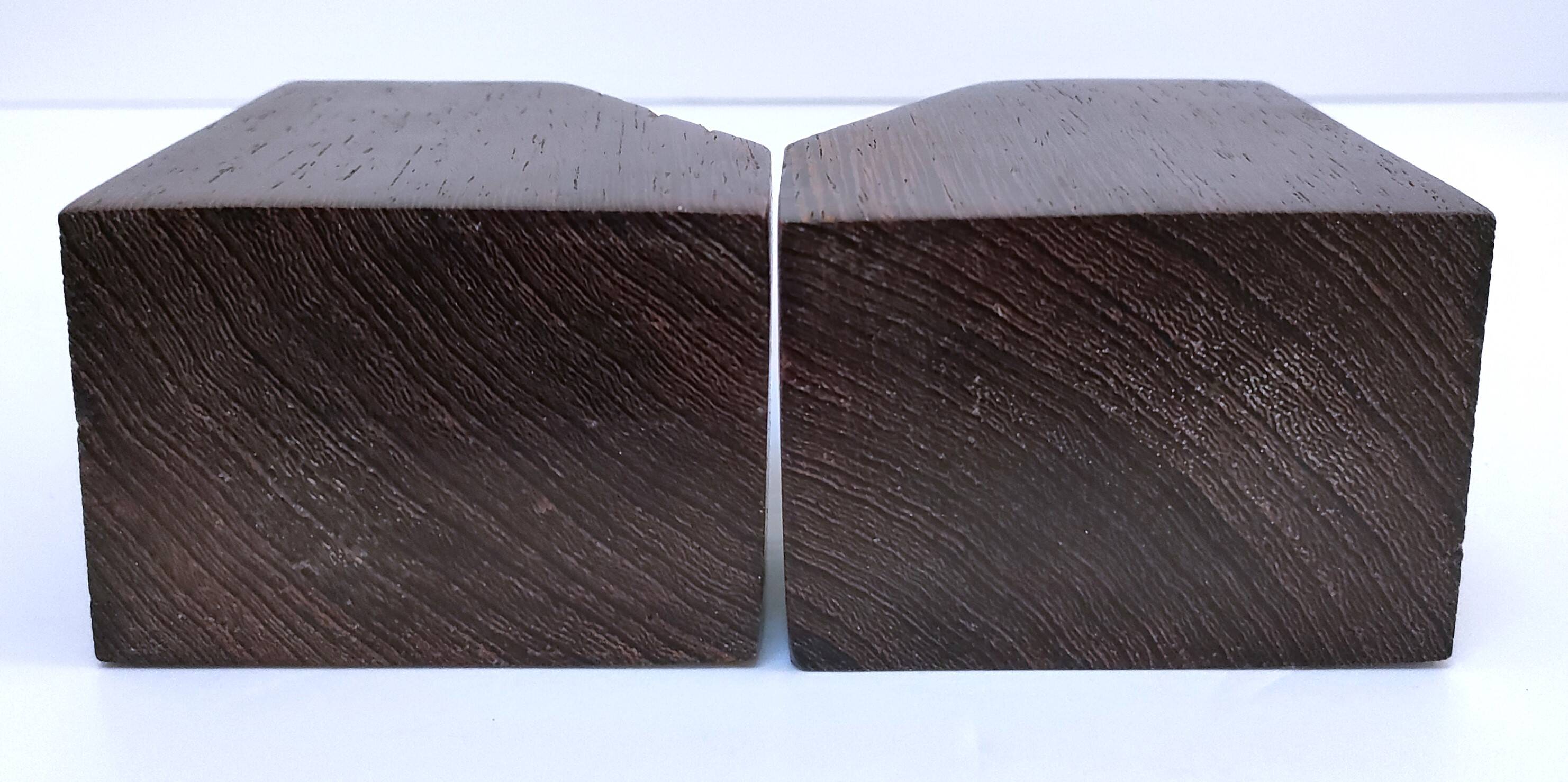 Pair of stylized elephant bookends in solid wood