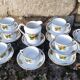 10 tea cups and creamer in Limoges porcelain