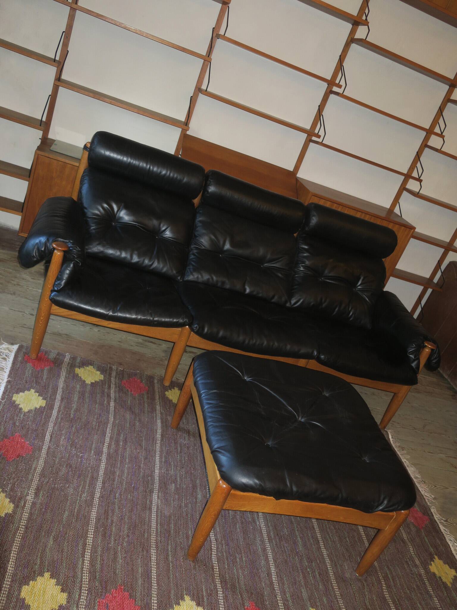Eric Merthen leather sofa with matching ottoman, Sweden 1960s