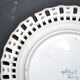 Painted collector's plate with openwork edge epinal by henri schmitt 1900